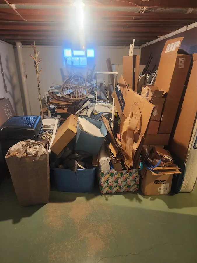 Roll-off dumpster container at job site for 6 Yard Dumpster Rental in Gilford